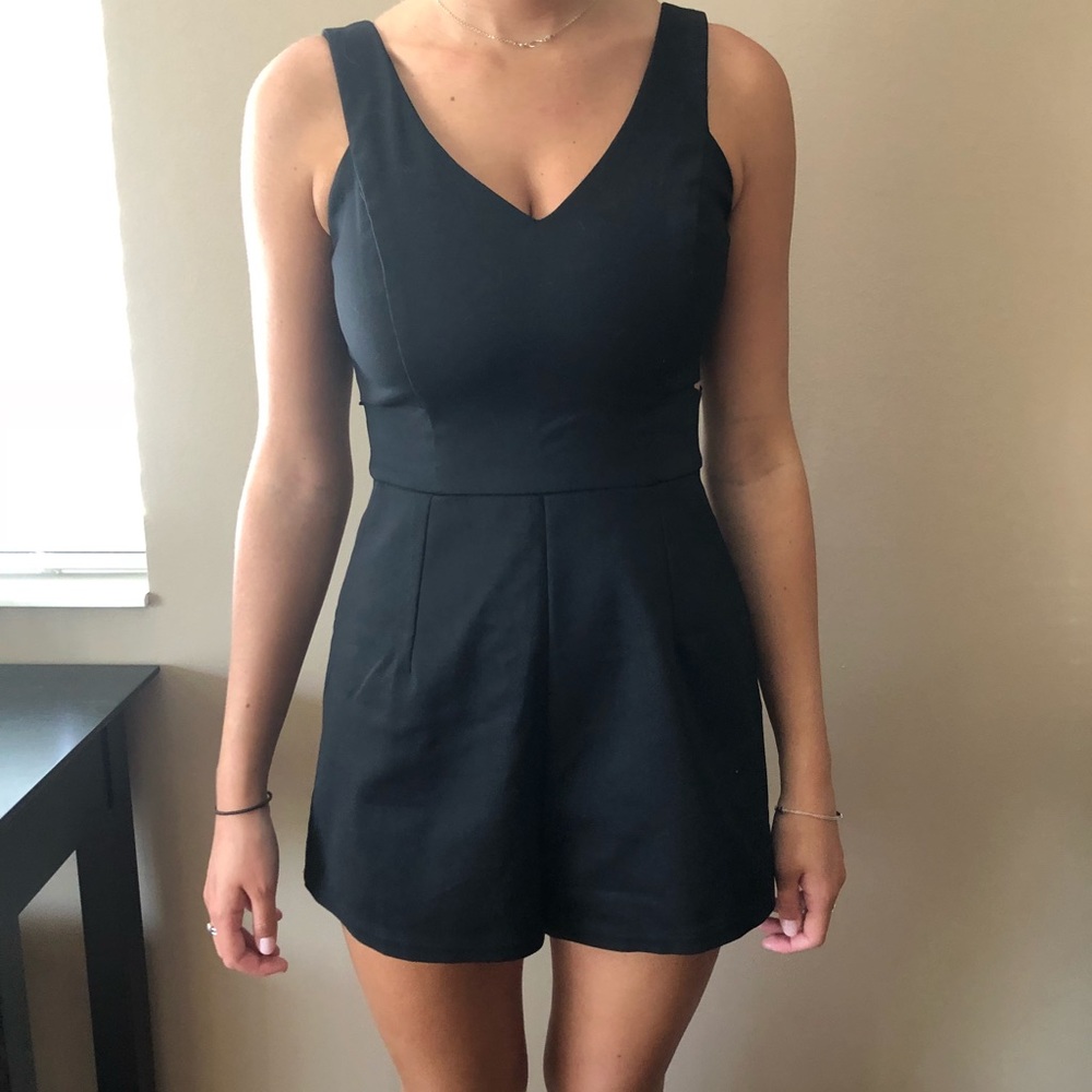 Black LF romper with tags